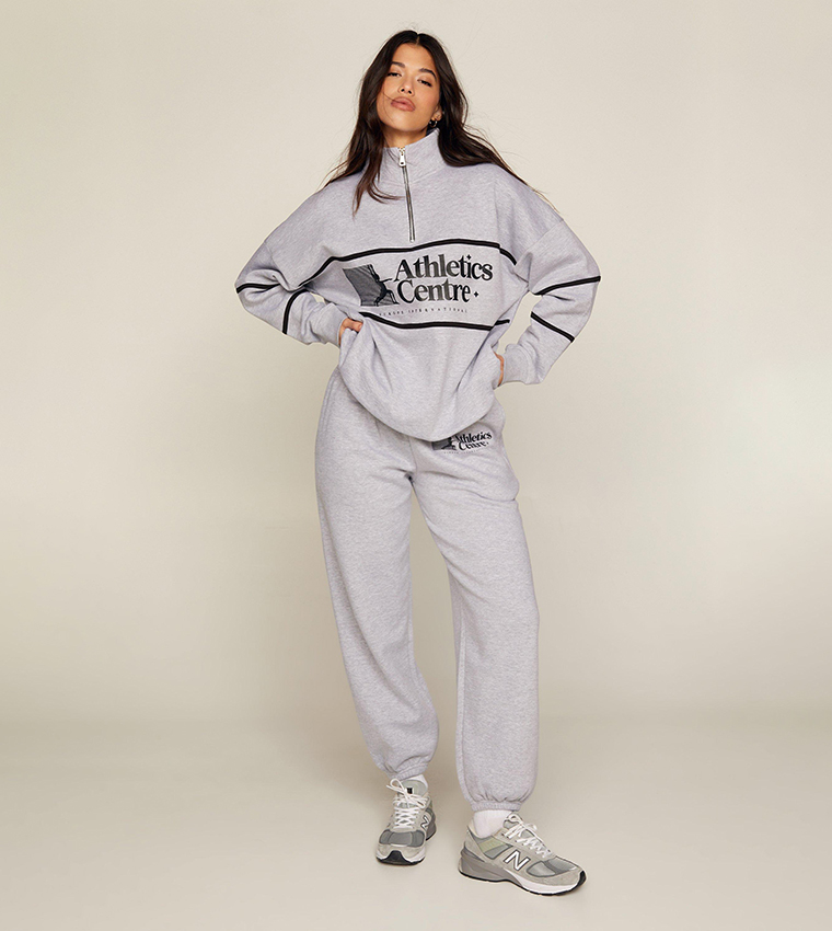 Buy Nasty Gal Athletics Centre Oversized Mid Rise Joggers In Grey 6thStreet UAE