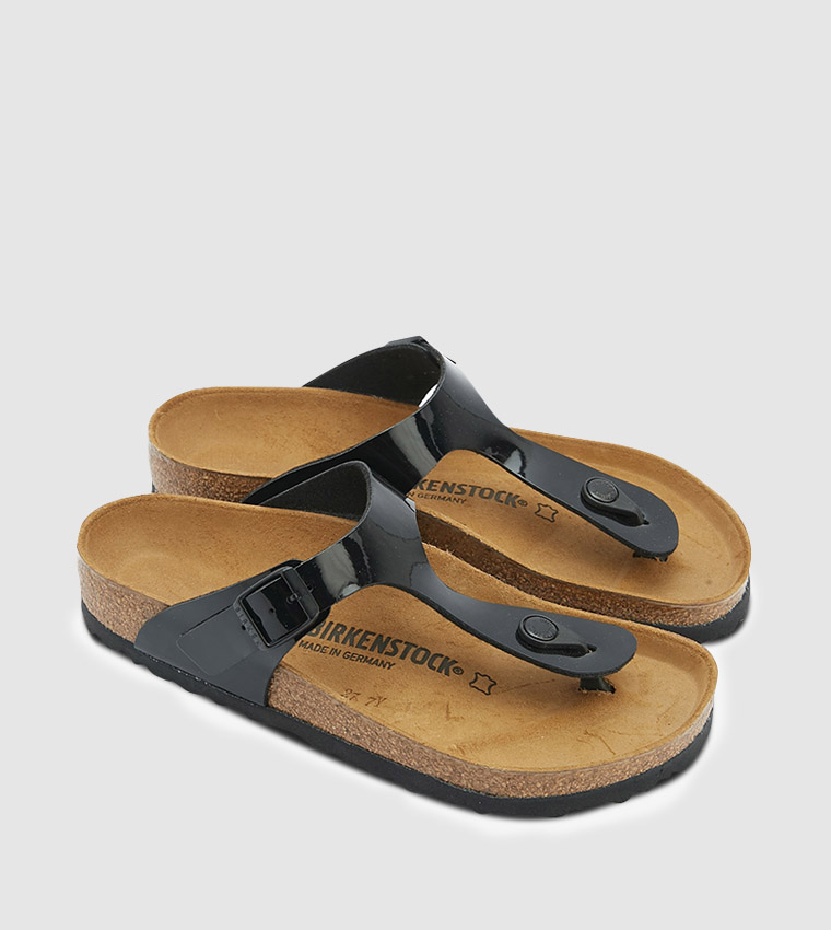 Buy Birkenstock T Strap Buckle Detailed Sandals In Black | 6thStreet Oman