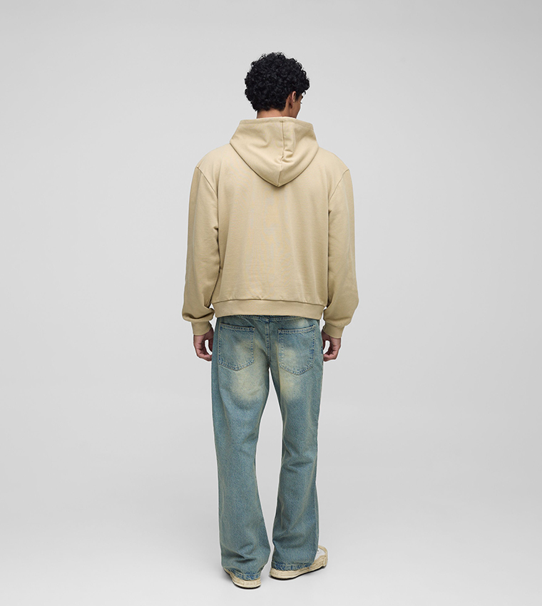 Rigid Faded Mid Rise Flared Jeans