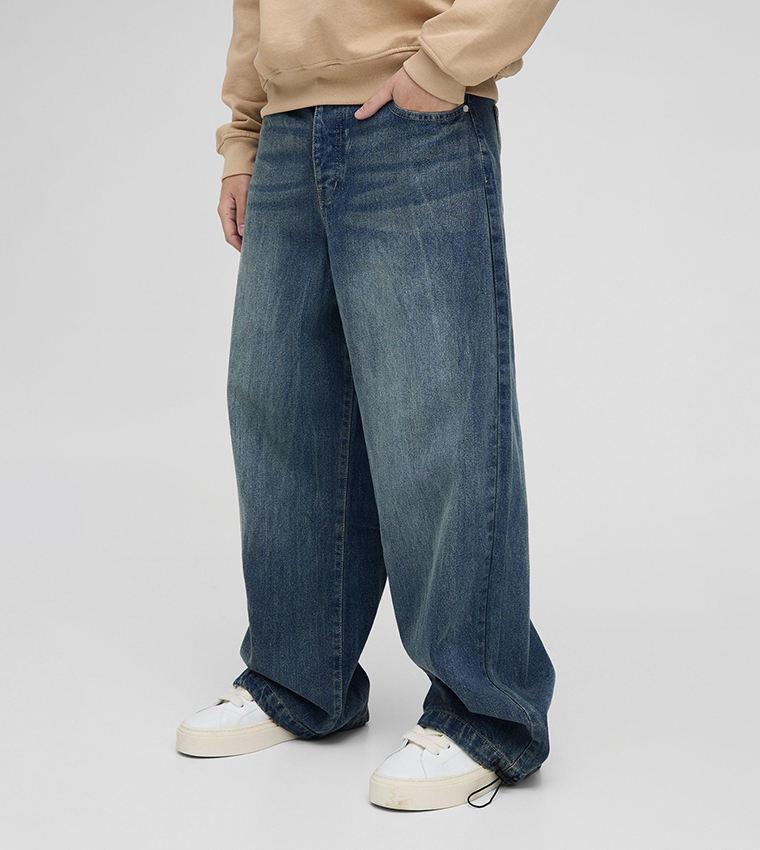 Faded Mid Rise Parachute Jeans