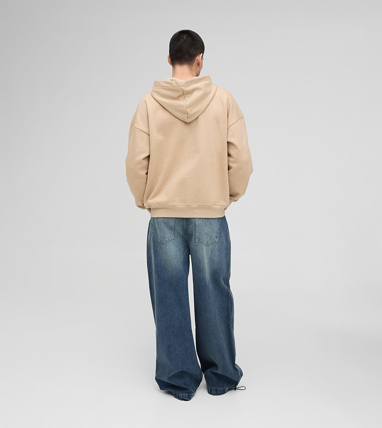Faded Mid Rise Parachute Jeans