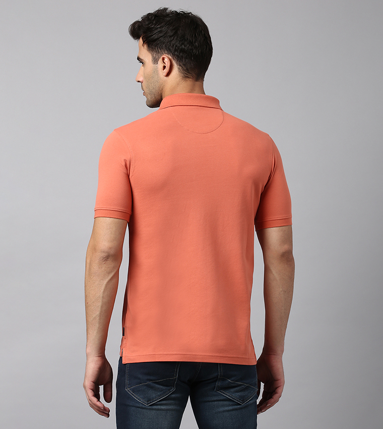 Orange polo store