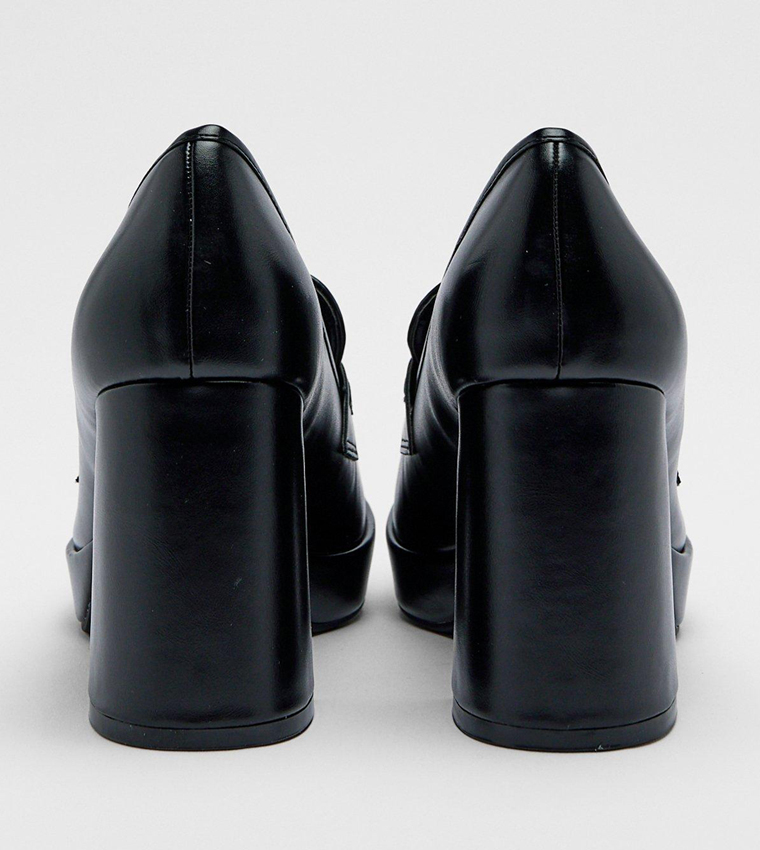 Mary Jane pumps in faux patent leather