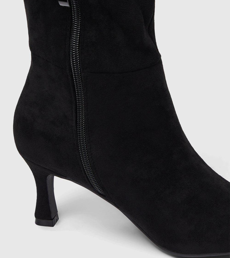 flared heel knee high boots