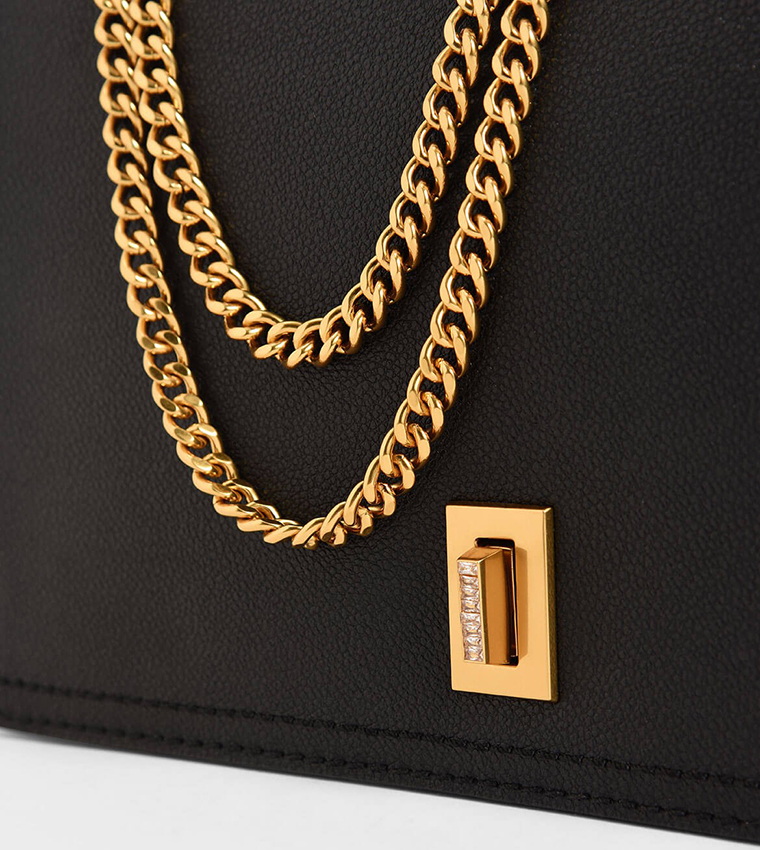 Charles & Keith card holder bag in black with gold chain strap