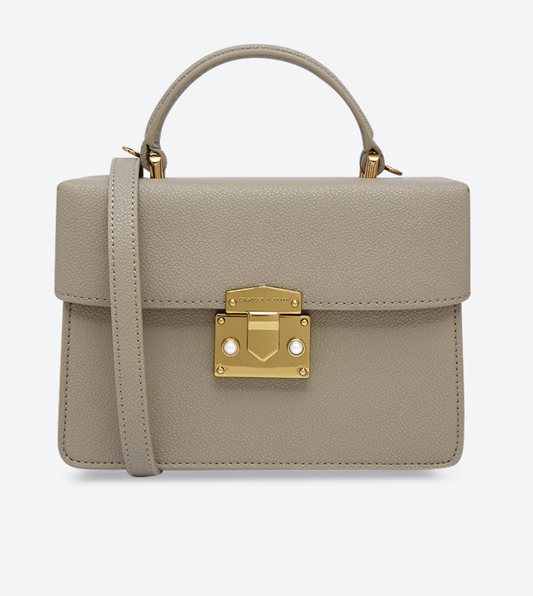 حقيبة يد بلون بيج