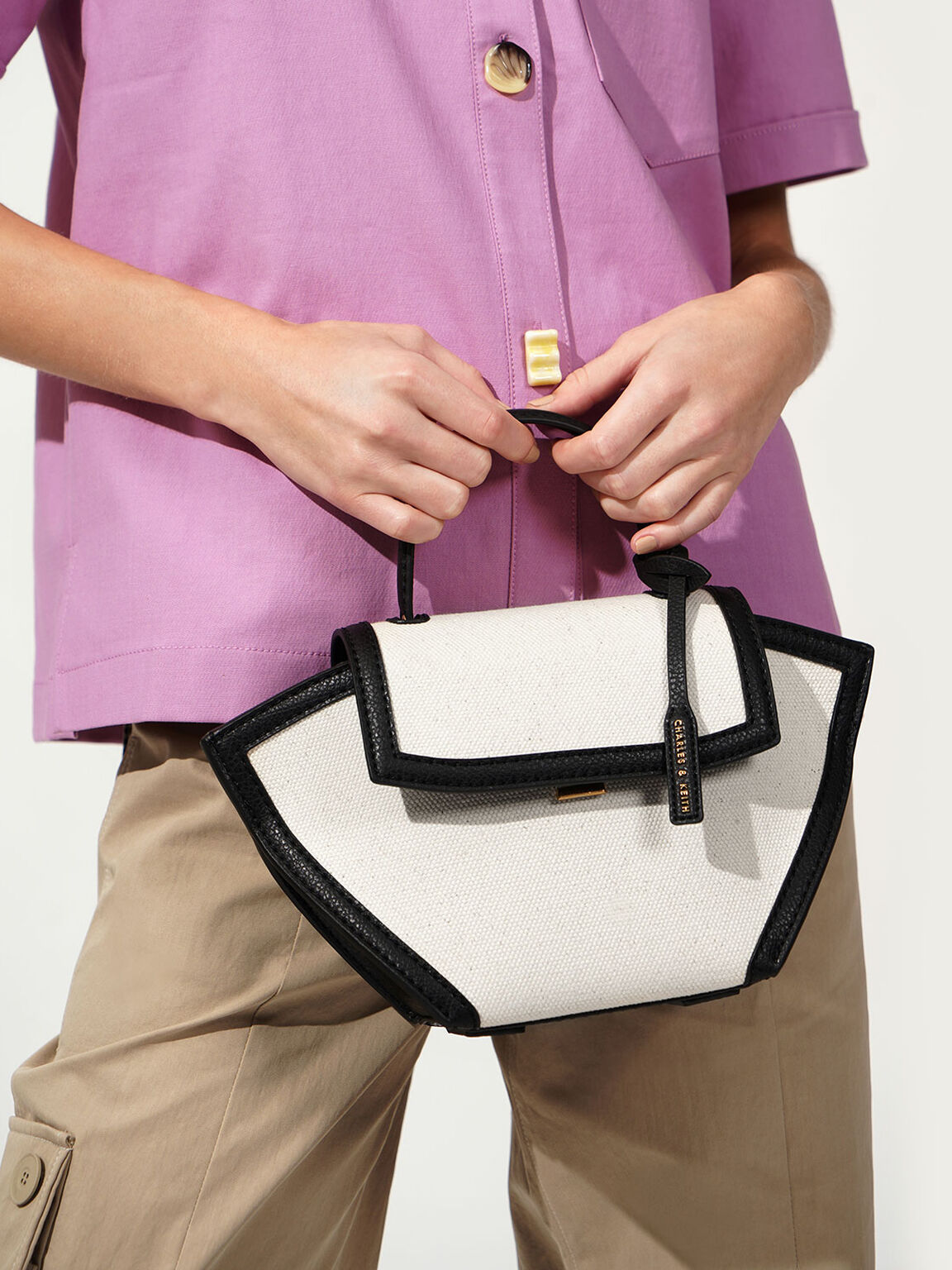 Buy Charles Keith Trapeze Top Handle Bag Cognac In Black