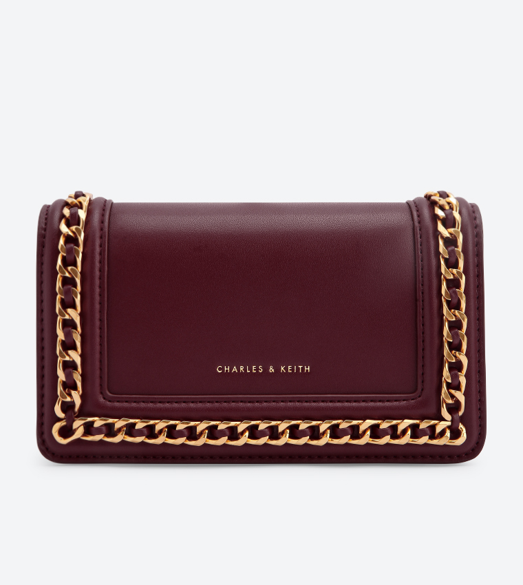 Buy Charles Keith Chain Rimmed Clutch Maroon CK2 70840146 1 In Red 6thStreet Oman