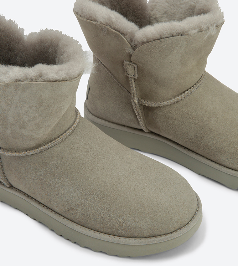 Buy Ugg Classic Cuff Mini Round Toe Boots Grey CLASSIC CUFF MINI In Grey 6thStreet Qatar