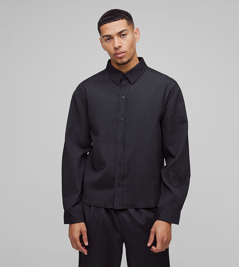 قميص خارجي بكسرات 