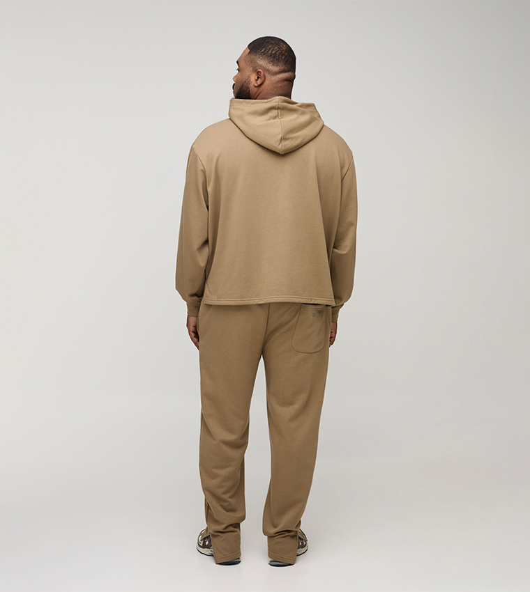 Tonal Embroidered Split Hem Sweatpants