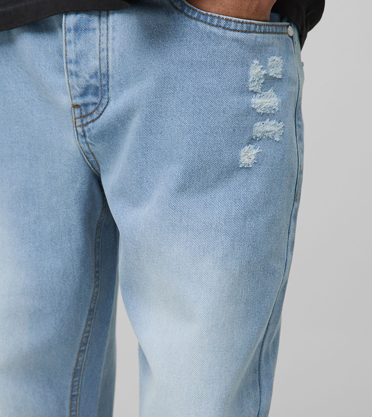 Washed Distressed Gusset Flared Jeans