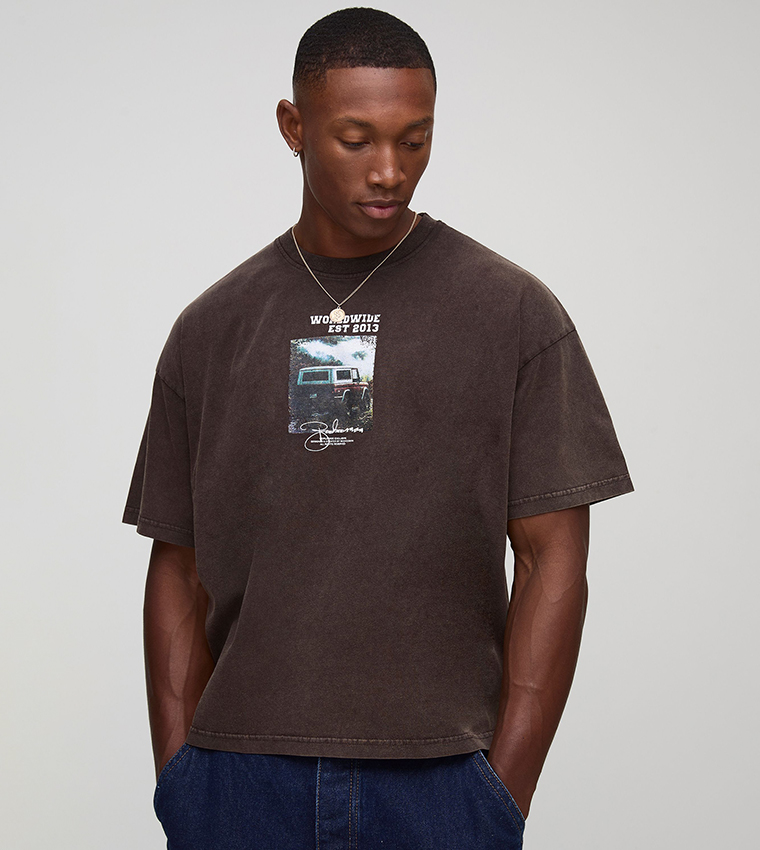 Buy BoohooMAN Washed Distressed Retro Graphic Oversized T Shirt In