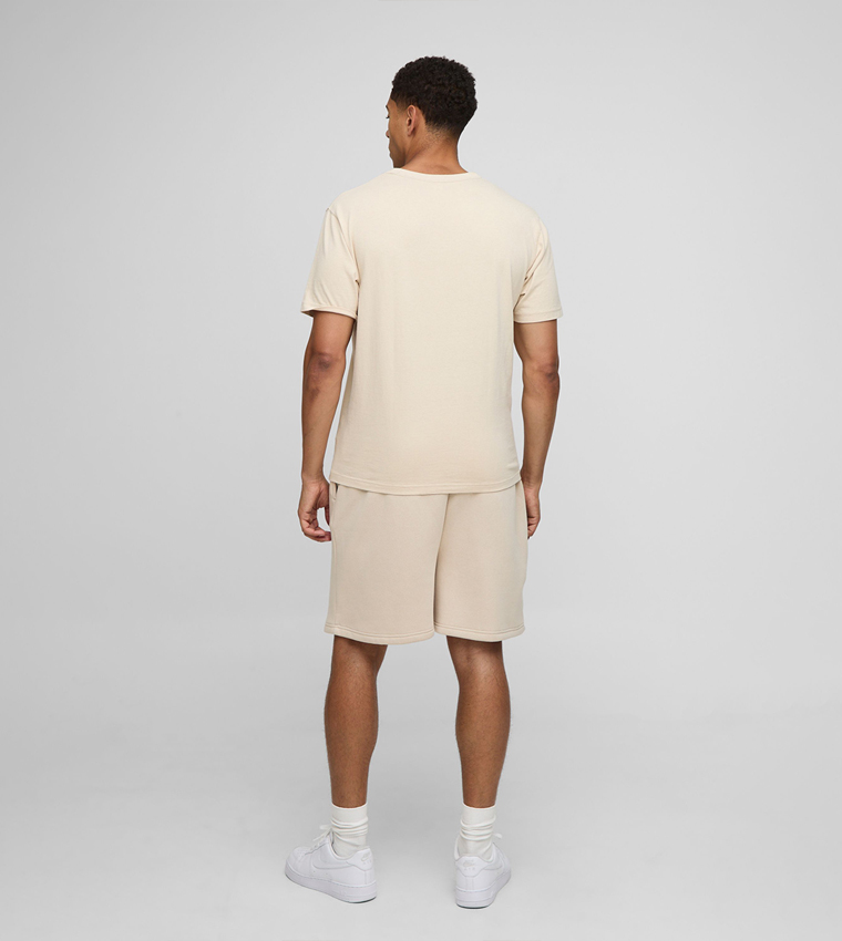 Worldwide Embossed Drop Crotch Oversized Shorts
