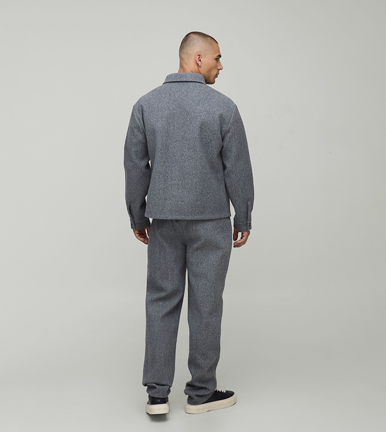 قميص واسع محبوك وممشط بقصة عادية