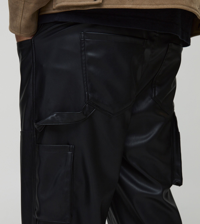 Buy BoohooMAN Tall Leather Look Flared Carpenter Trousers In Black