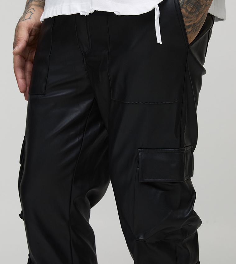 Buy BoohooMAN Tall Leather Look Multi Cargo Stacked Flared