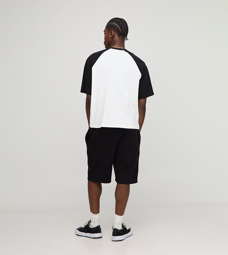 Oversized Worldwide Embroidered Mid Length Shorts