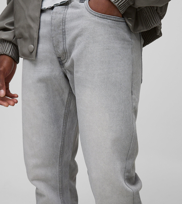 Slim Fit Subtle Ripped Tinted Jeans with Let Down Hem