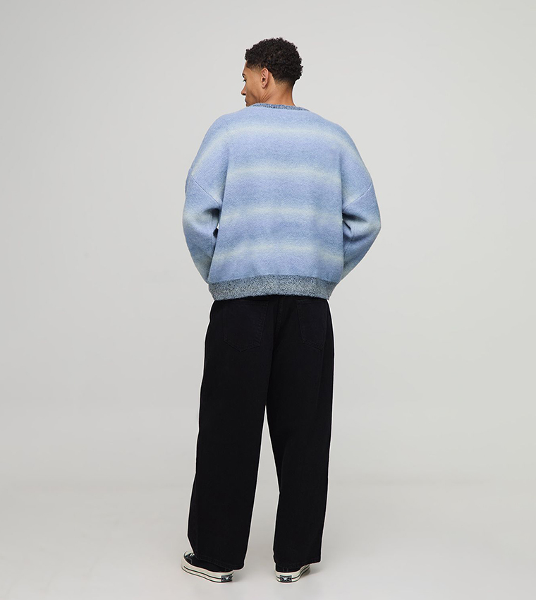 جمبر محبوك اوفرسايز مخطط بطبعة 