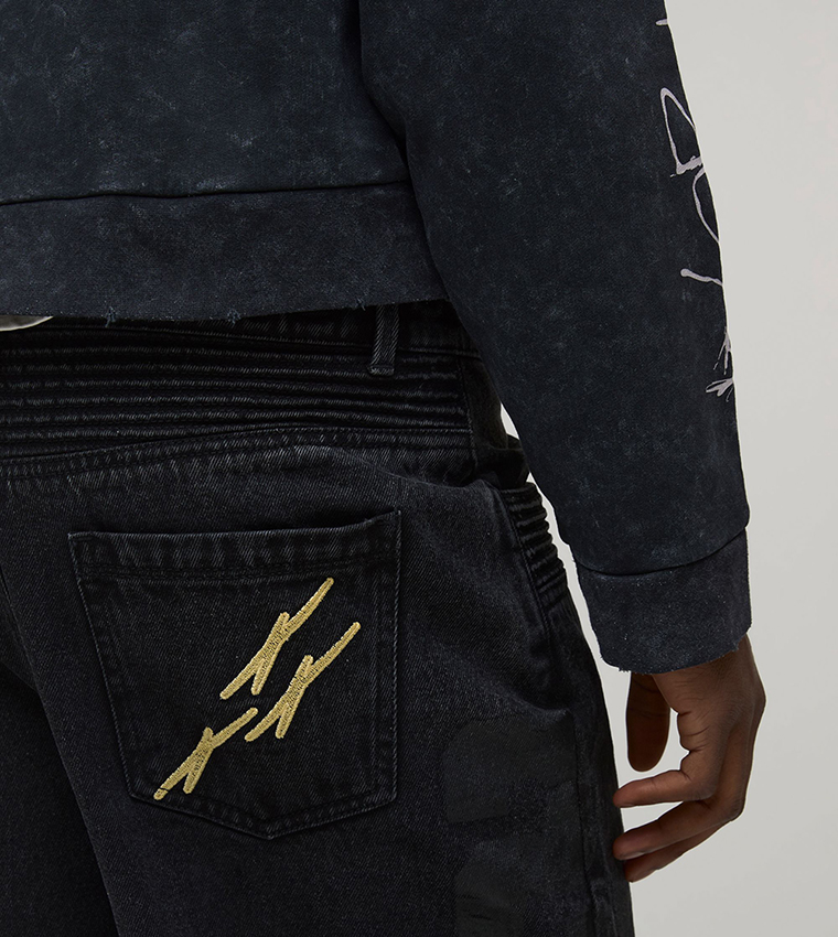 بنطلون جينز واسع مرن