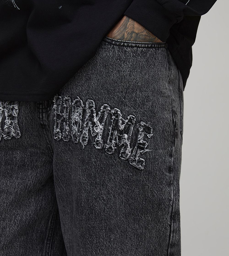 جينز مغسول للمقاسات الطويلة 