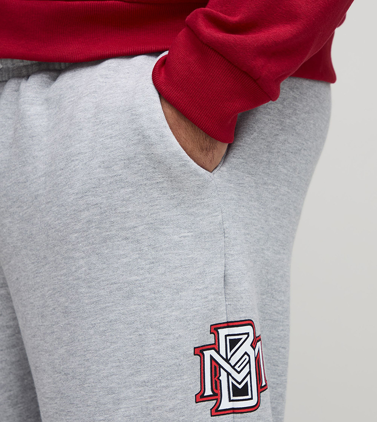 Baggy Fit Varsity Badge Print Sweatpants