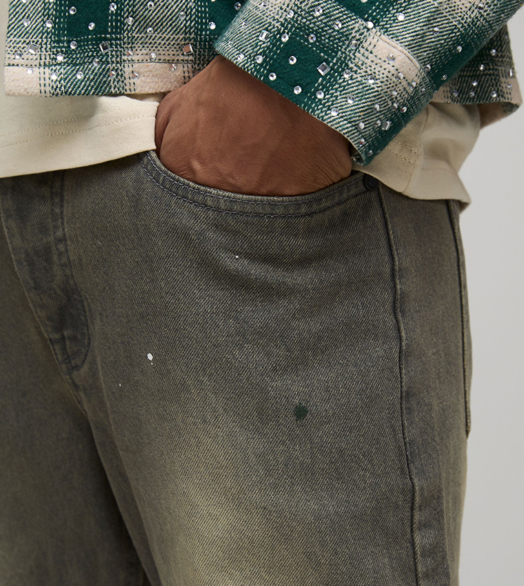 Knee Rip and Repair Paint Splatter Slim Flared Jeans