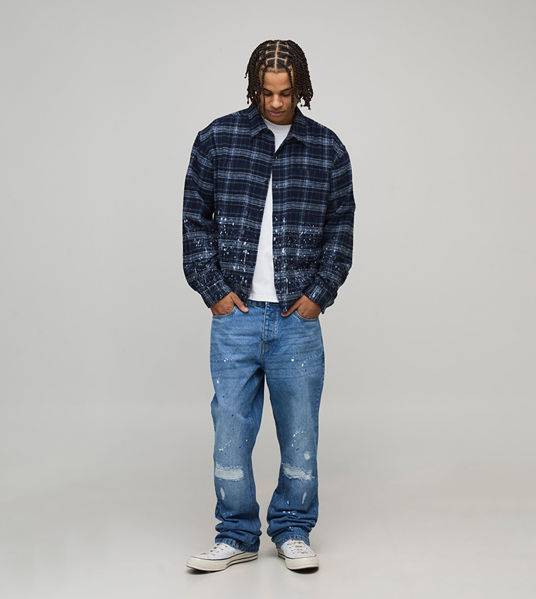 Knee Rip and Repair Paint Splatter Slim Flared Jeans