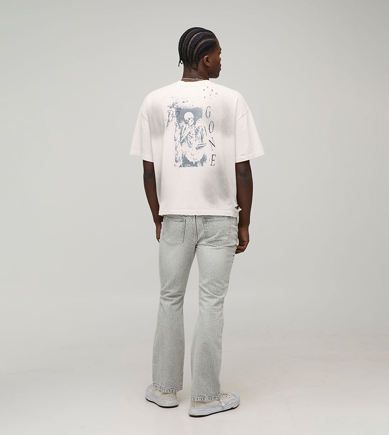 جينز فلير مغسول بقصة ضيقة 