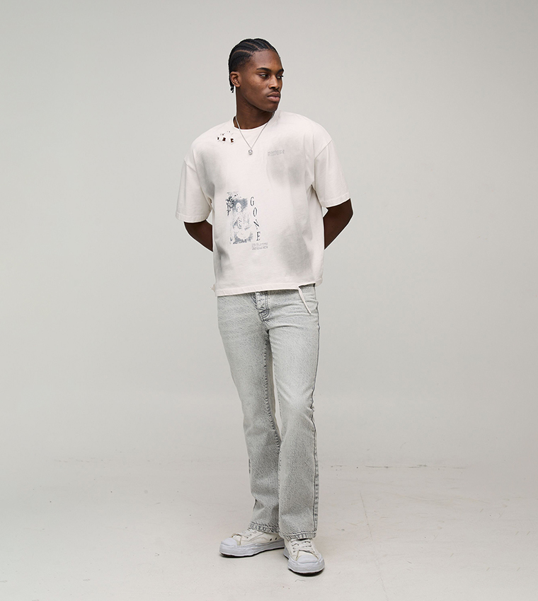 جينز فلير مغسول بقصة ضيقة 