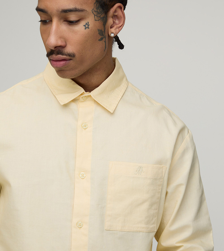 قميص أكسفورد أوفرسايز بكم طويل 