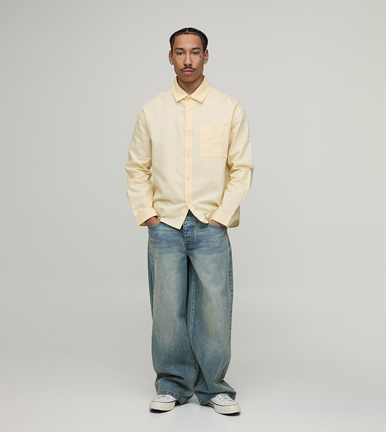 قميص أكسفورد أوفرسايز بكم طويل 