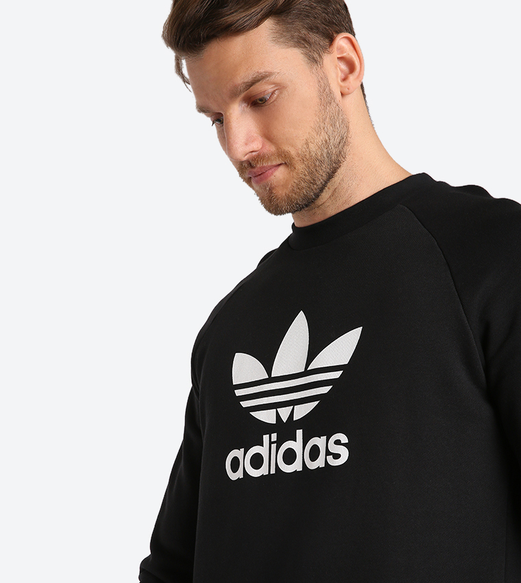 Cerebro cuestionario Casco Buy Adidas Originals Trefoil Warm Up Crew Neck Sweatshirt Black CW1235 In  Black | 6thStreet Kuwait