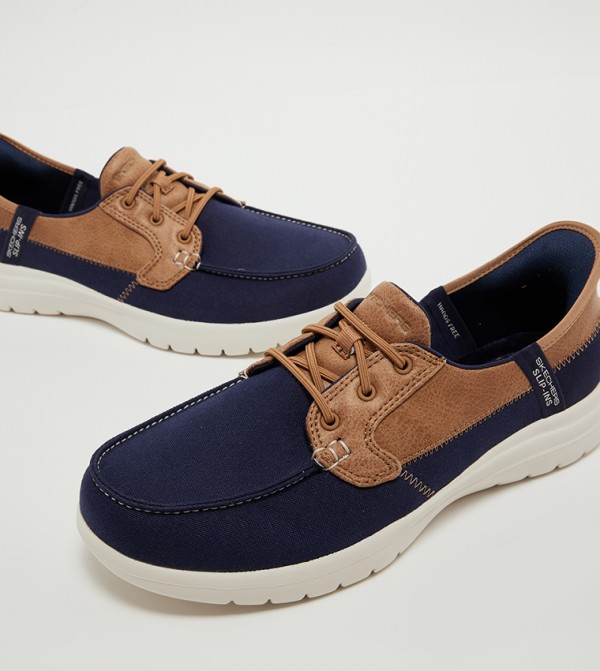 Skechers  - Navy Casual Slip-ons