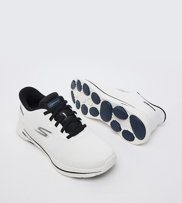 Skechers  - White Walking Shoes