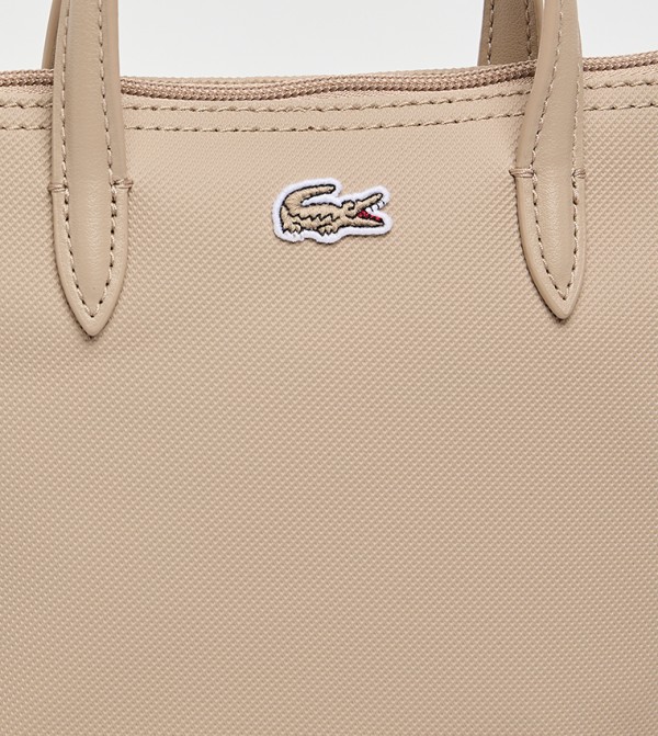 Lacoste Lacoste - Beige Handheld Bags