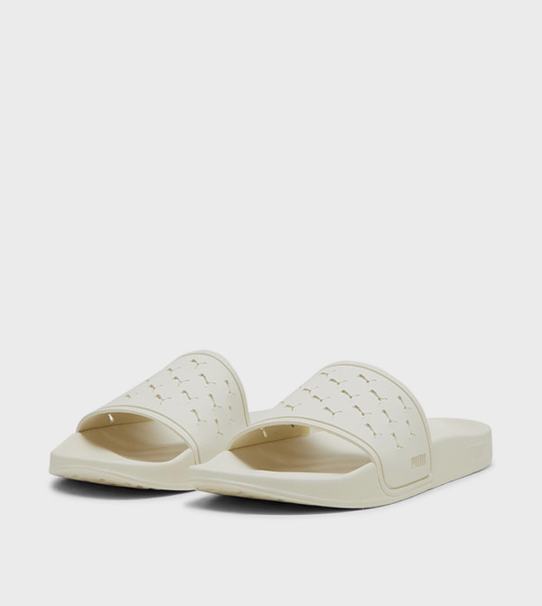 Puma  Flip flops and Slides - Beige Slides