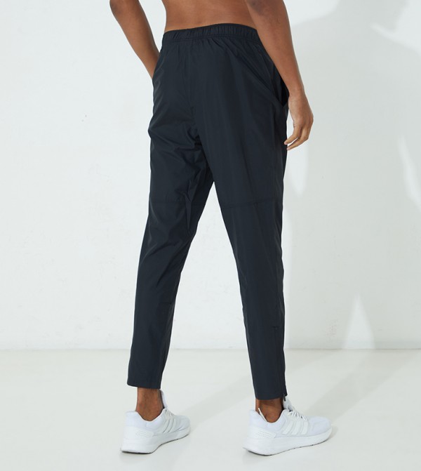 Asics Sportswear - Black Track Pants