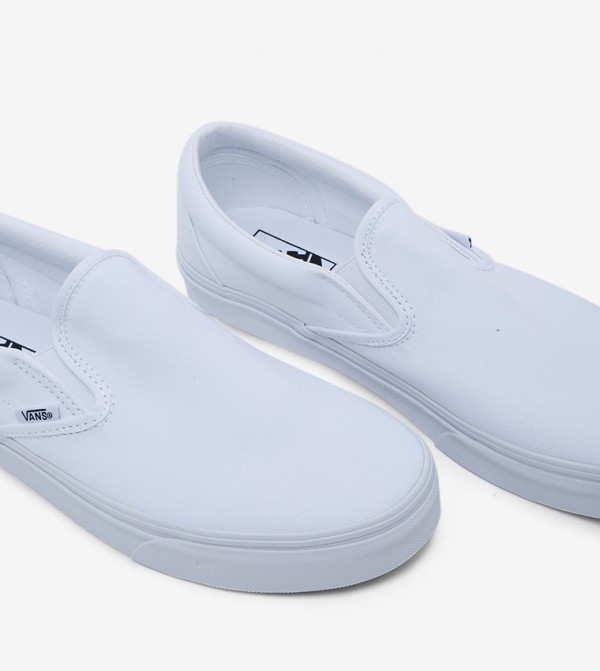 Vans  - White Slip-ons