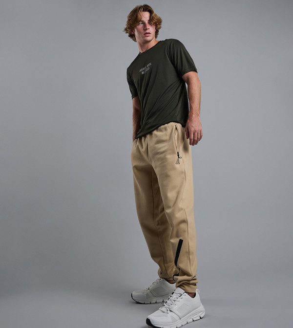 أر آند بي  - بيج Track Pants & Joggers