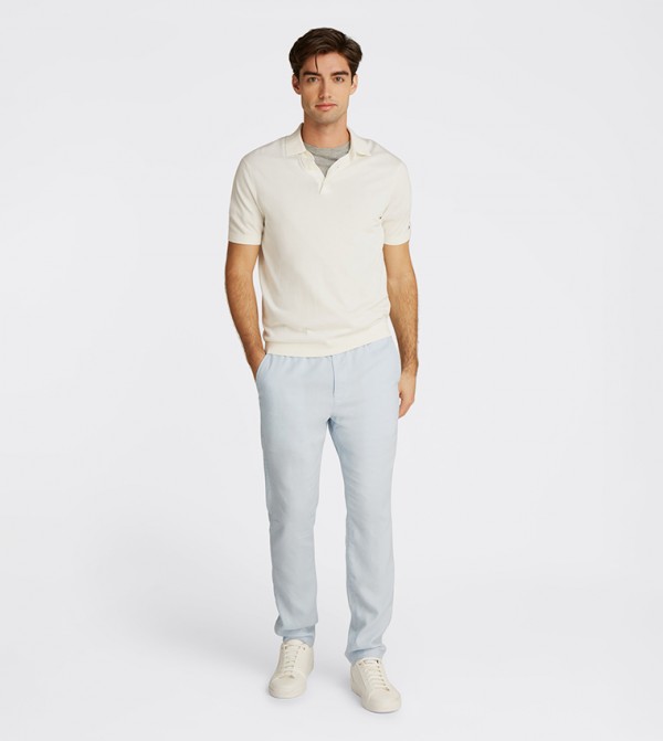 Tommy Hilfiger  Polo T-Shirts - Cream Polo T-shirts