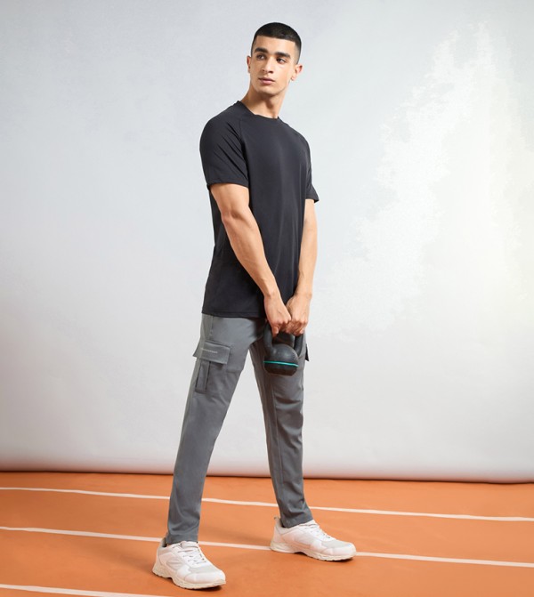 تكنوسبورت  - رمادي Track Pants & Joggers