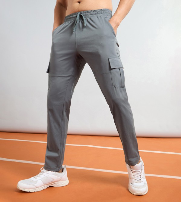 تكنوسبورت  - رمادي Track Pants & Joggers