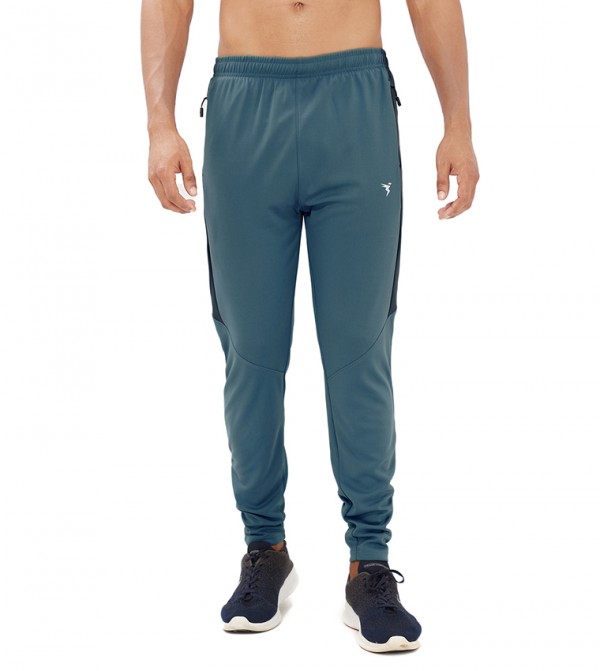 تكنوسبورت  - أخضر Track Pants & Joggers