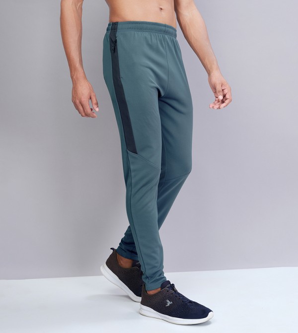 تكنوسبورت  - أخضر Track Pants & Joggers