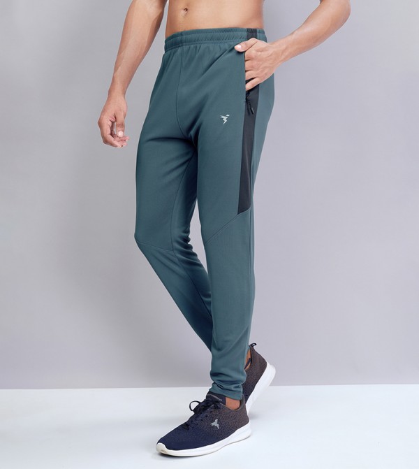 تكنوسبورت  - أخضر Track Pants & Joggers