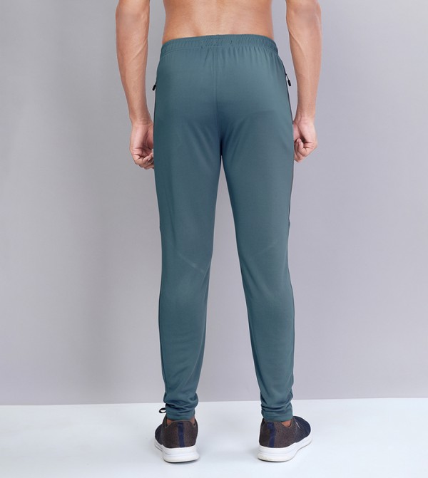 تكنوسبورت  - أخضر Track Pants & Joggers