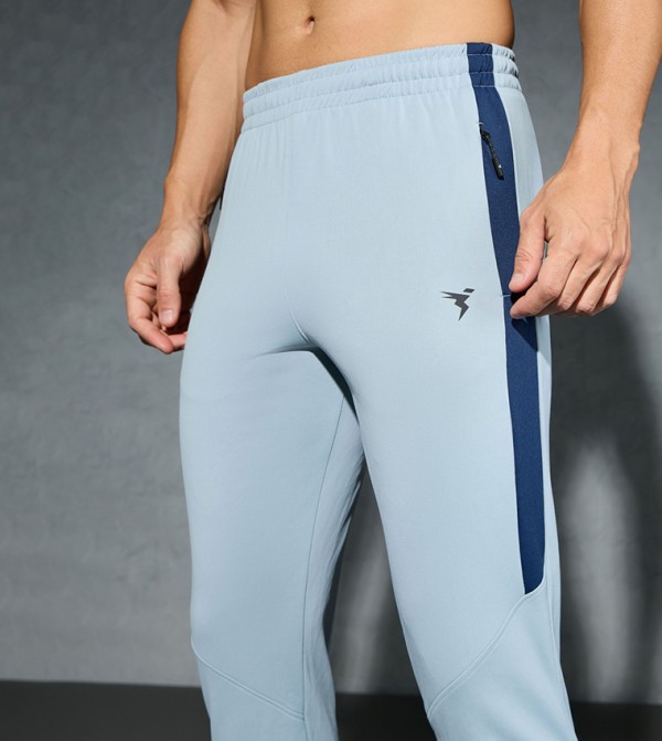 تكنوسبورت  - أزرق Track Pants & Joggers