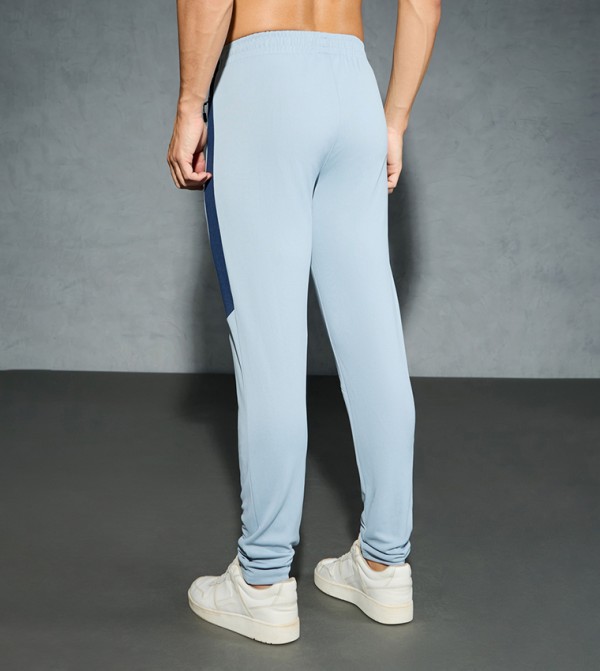 تكنوسبورت  - أزرق Track Pants & Joggers